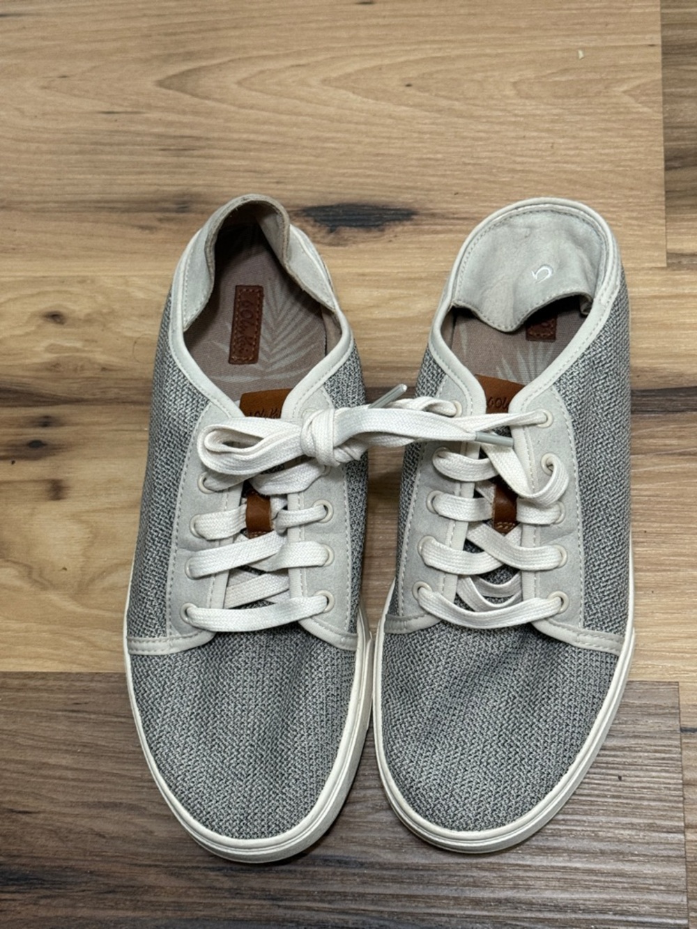 Women’s OluKai Canvas Lace-Up Sneakers in Light Gray w collapsible heel.